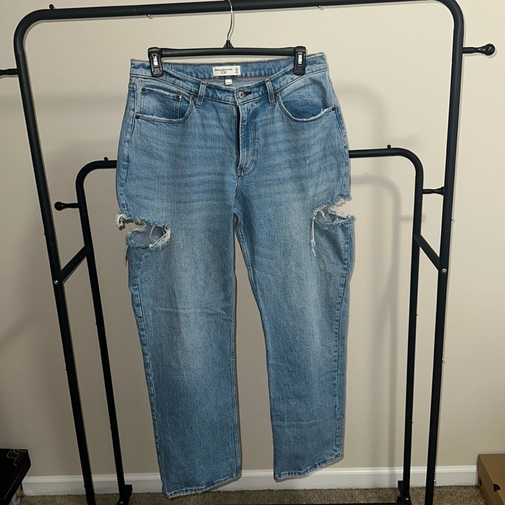 STRIGHT leg jeans with side distressing.